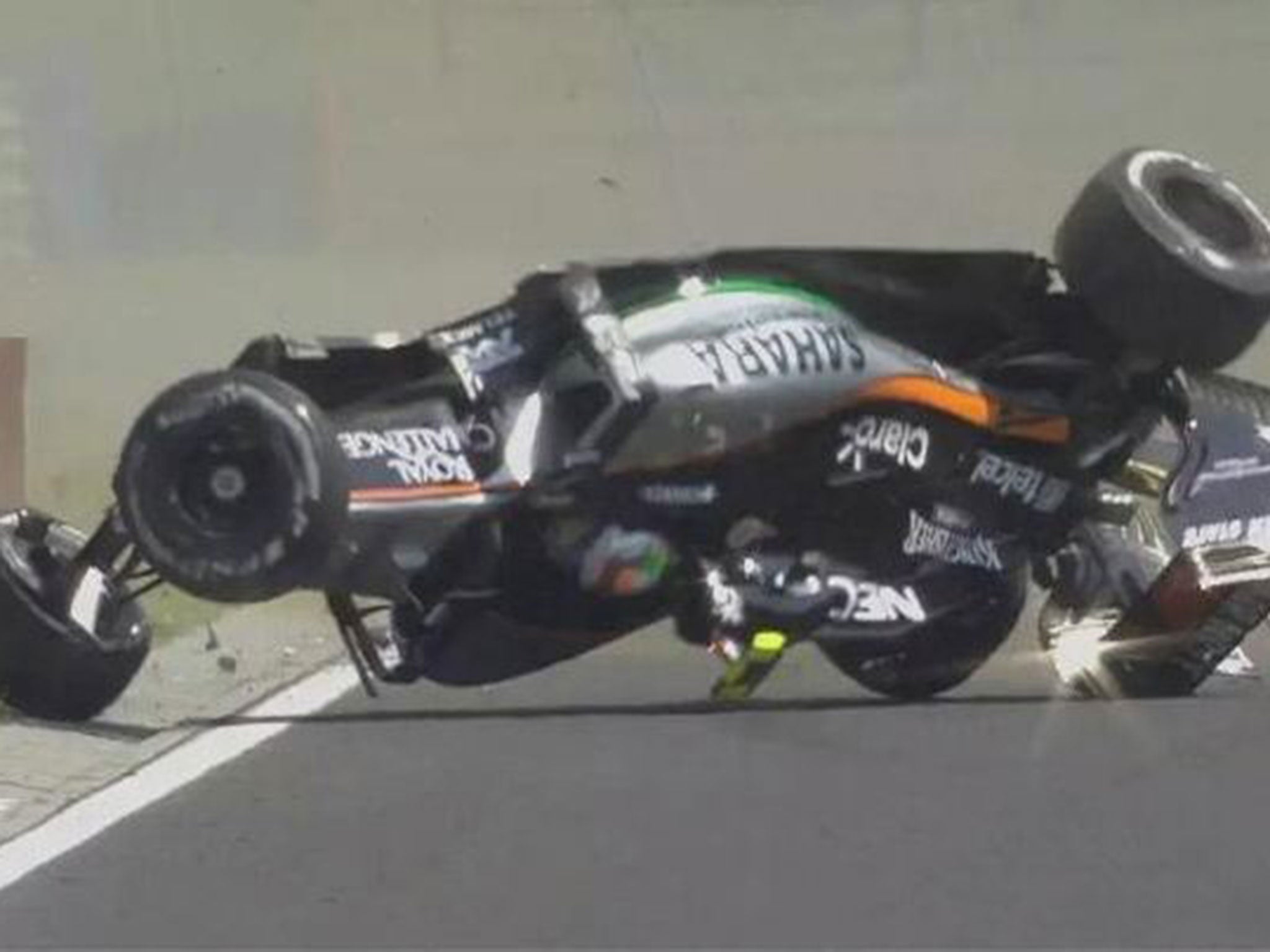 Sergio Perez flips upside-down during Hungary practice