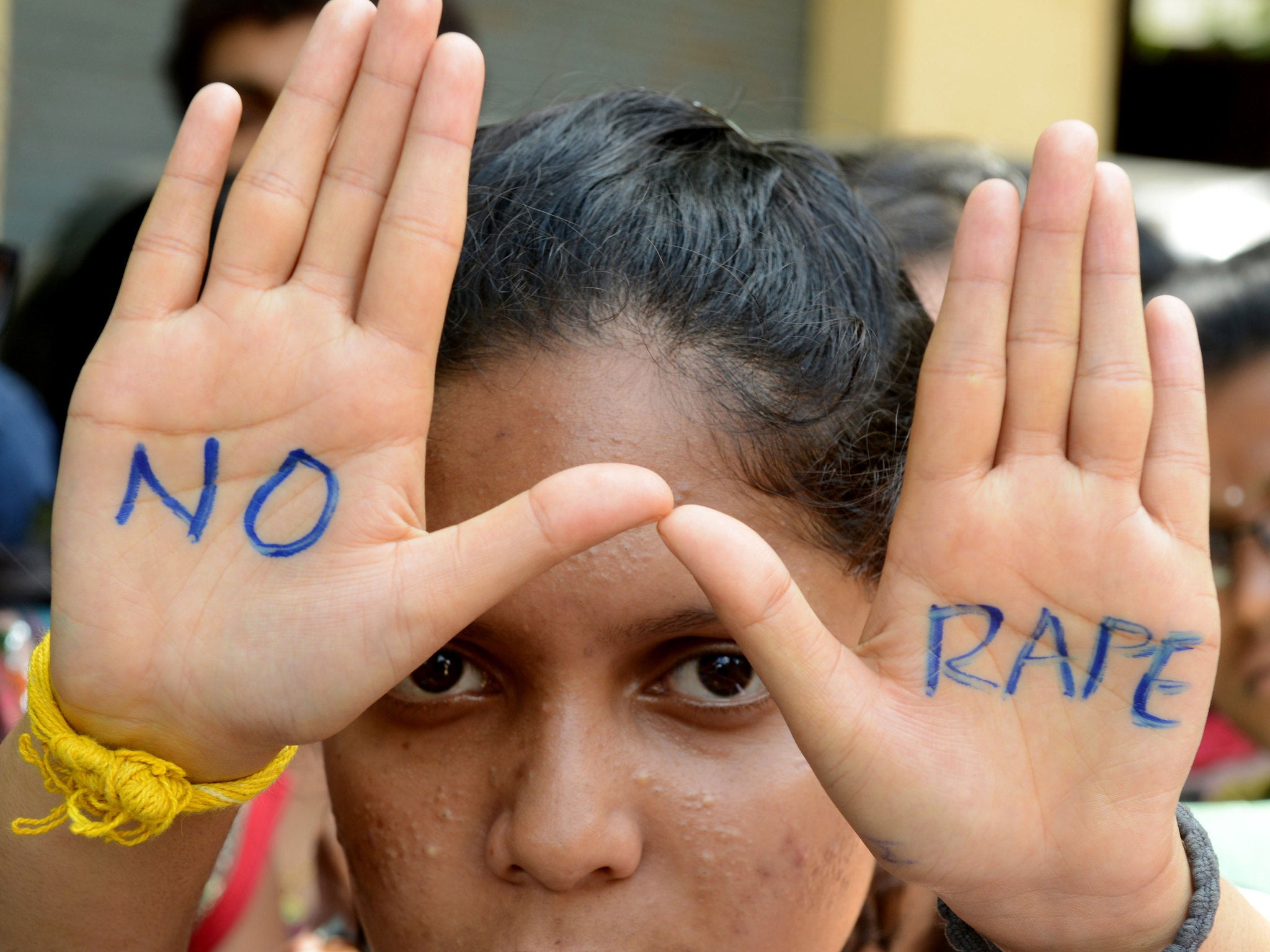 Indian students of Saint Joseph Degree college participate in an anti-rape protest in Hyderabad on September 13, 2013