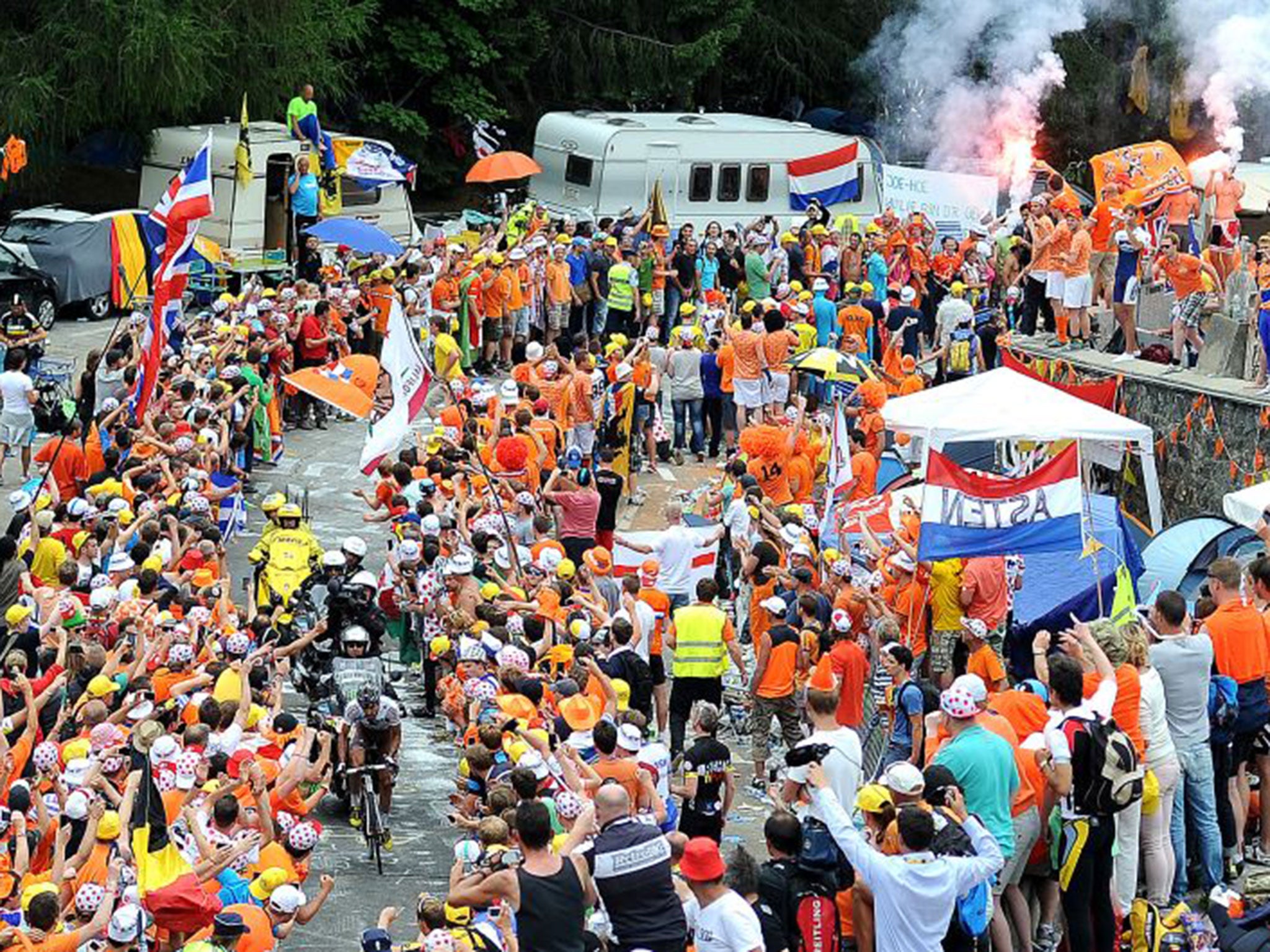 A rider attempts to make his way round Dutch Corner during the 2013 Tour de France