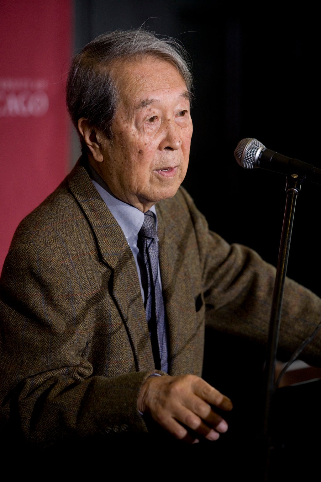 Nambu at a press conference in 2008 following his Nobel Prize win