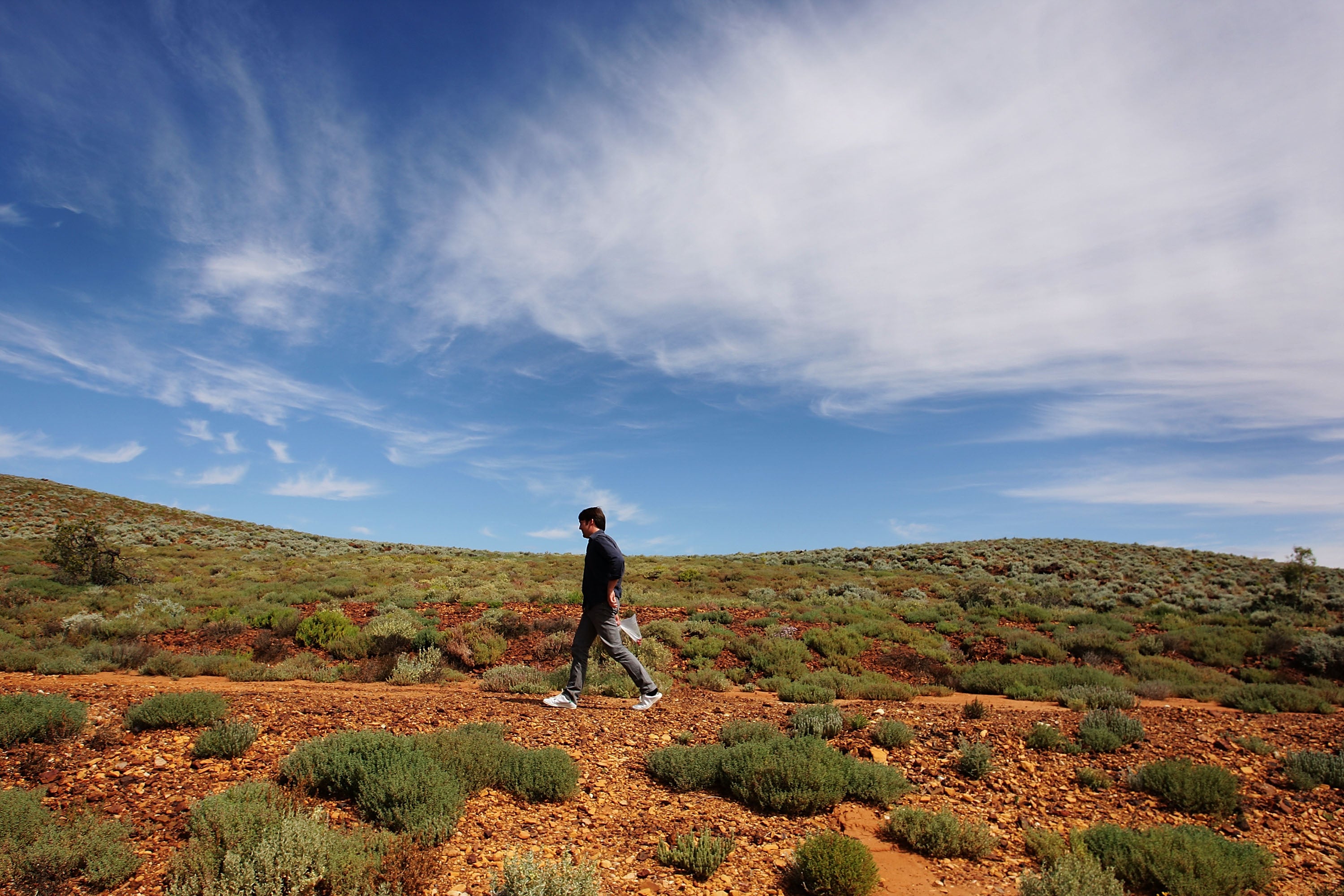 Rene Redzepi forages for food during a visit to Nepabunna land in the South Australian Outback