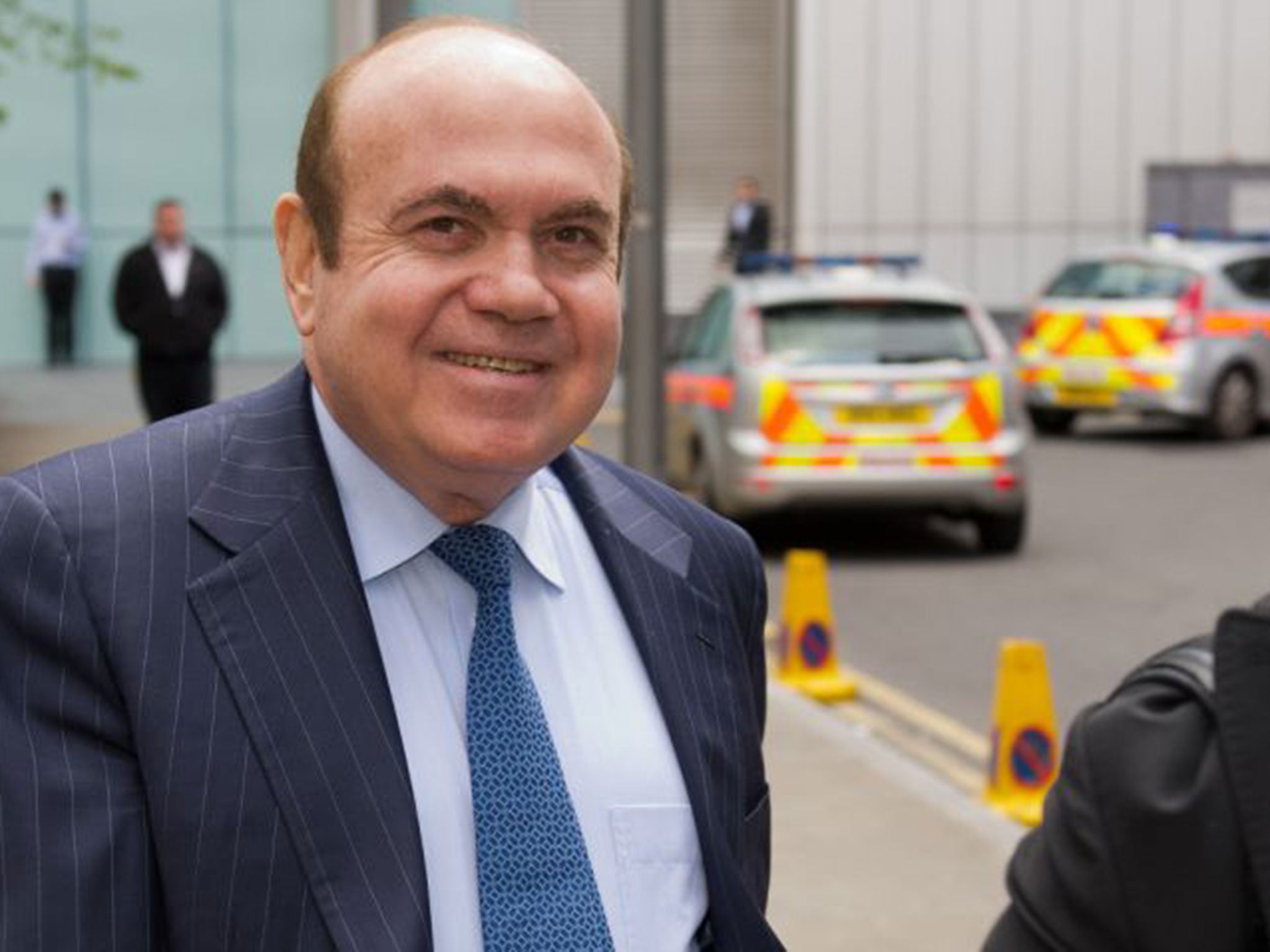 Jordanian-born billionaire businessman Victor Dahdaleh arrives at Southwark Crown Court in central London on April 16, 2012