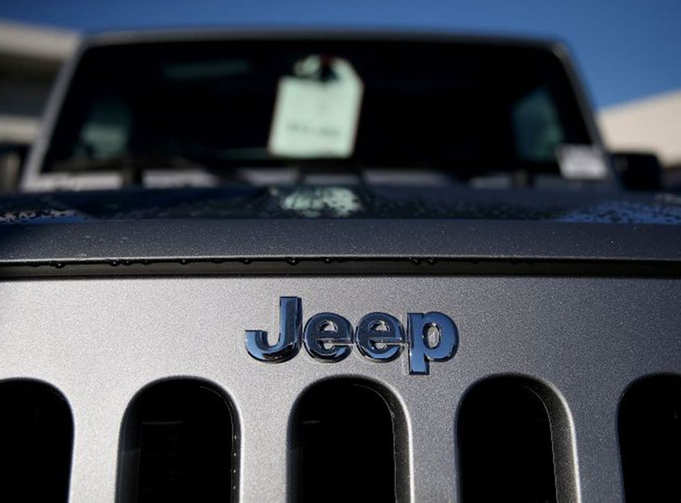 The Jeep logo is visible on a brand new Jeep at Chrysler Jeep Dodge Ram Marin