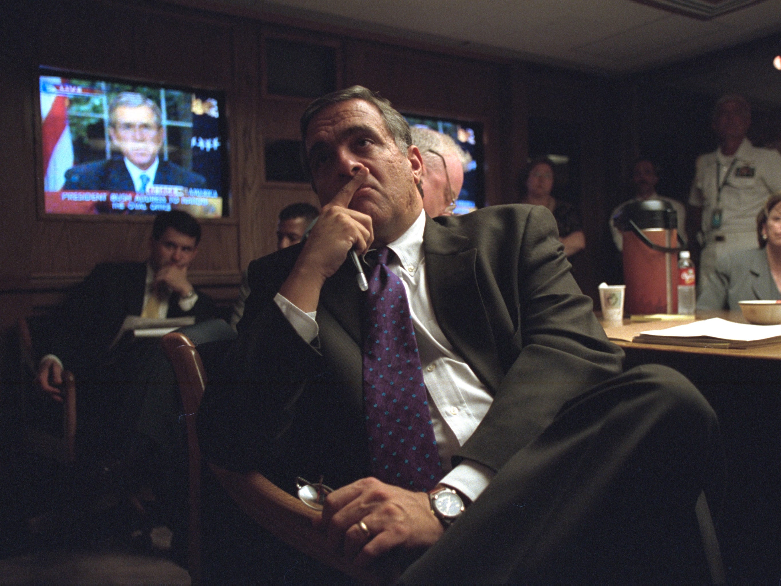 Head of the CIA watches President Bush's national address