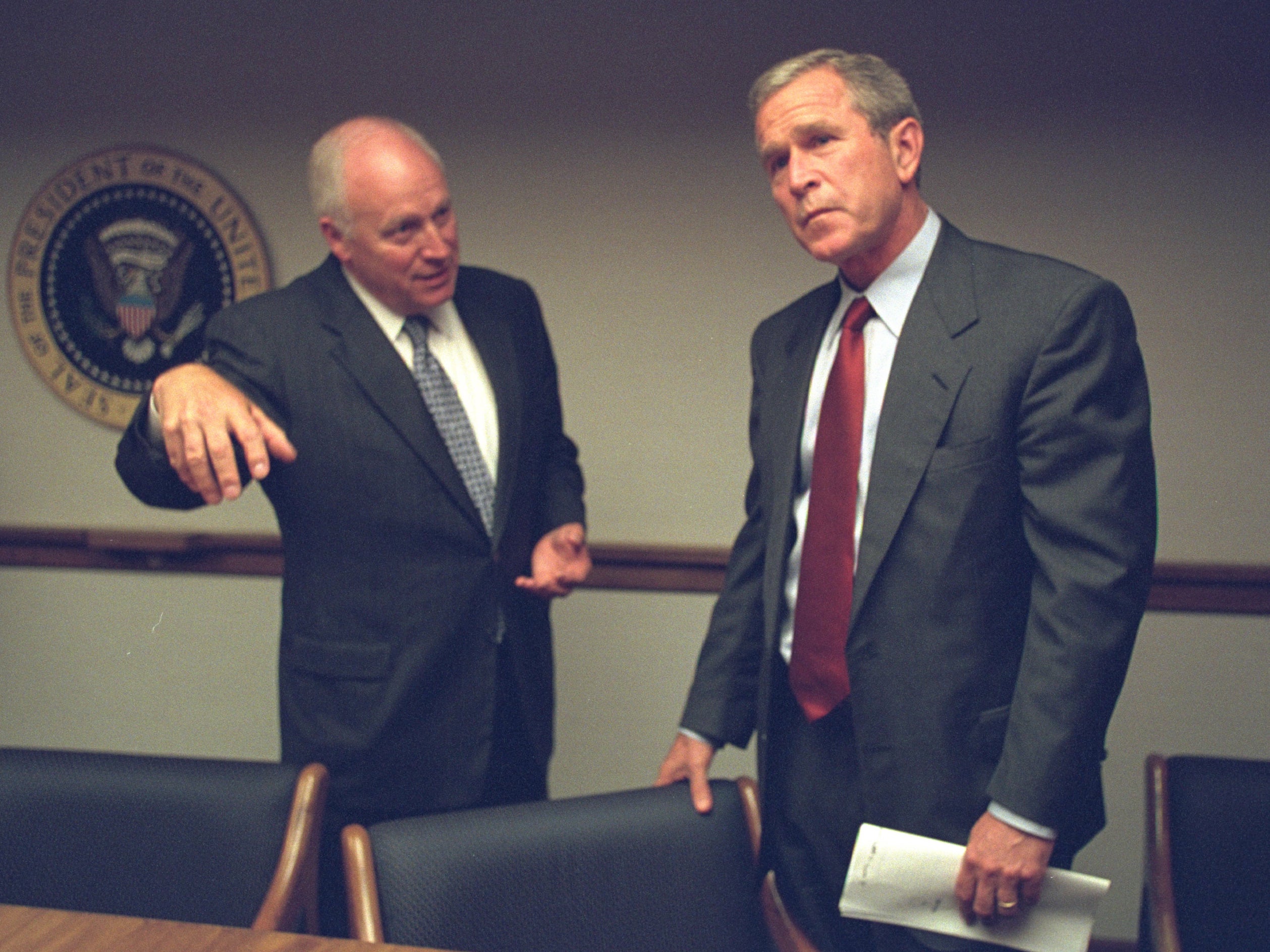 Dick Cheney speaks with former President Bush during post terrorist attack briefing