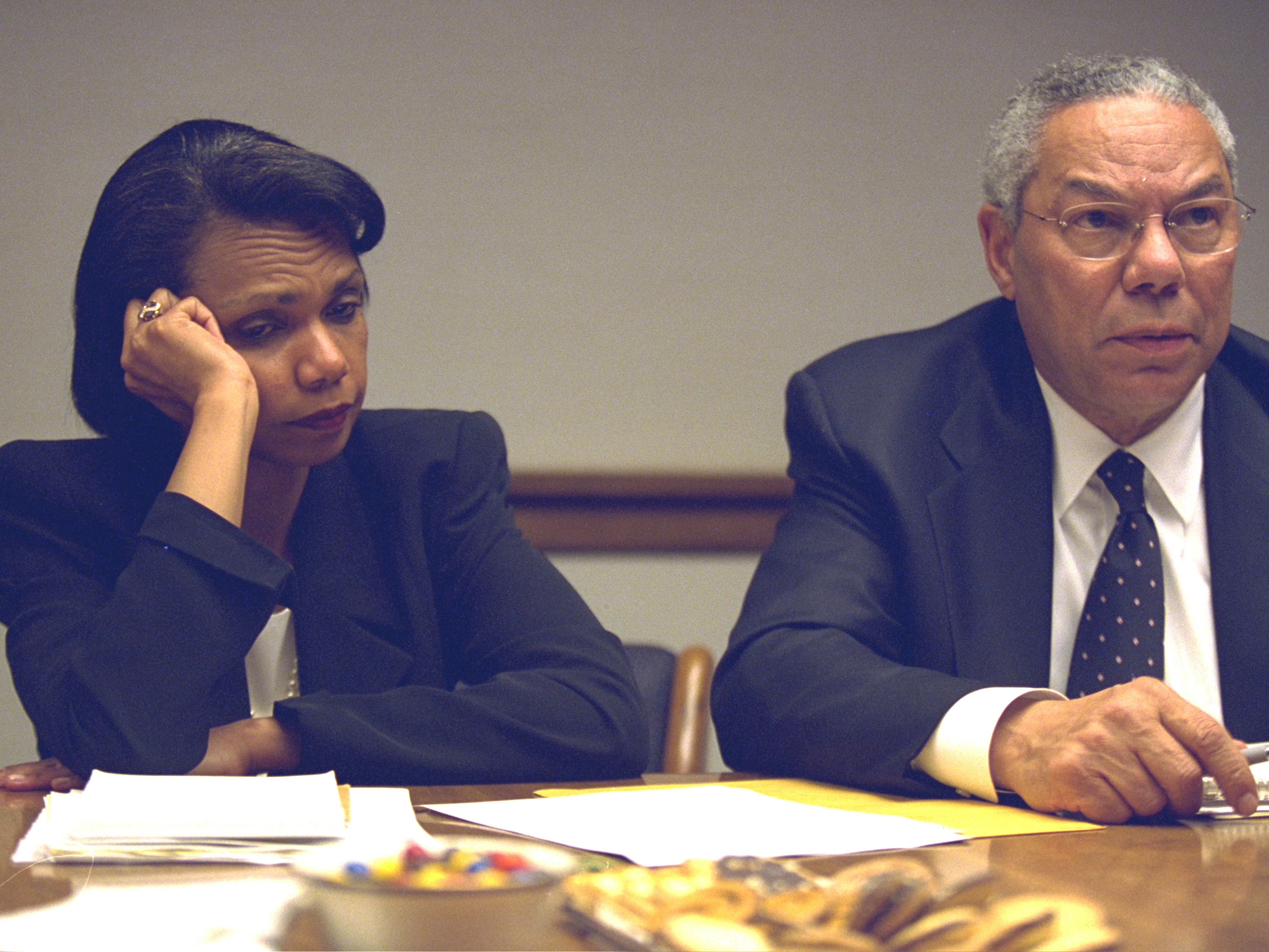 Condolezza Rice looks dismayed next to Colin Powell during crisis talks in the White House emergency bunker