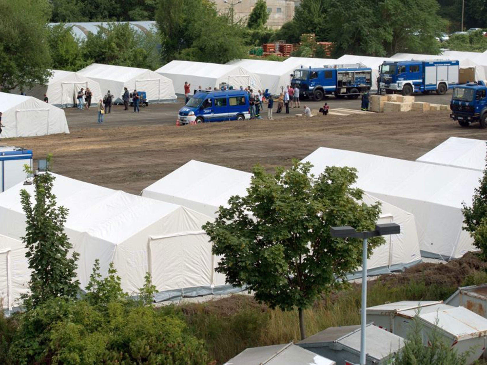 The German Red Cross has been erecting tents to house refugees fleeing Syria