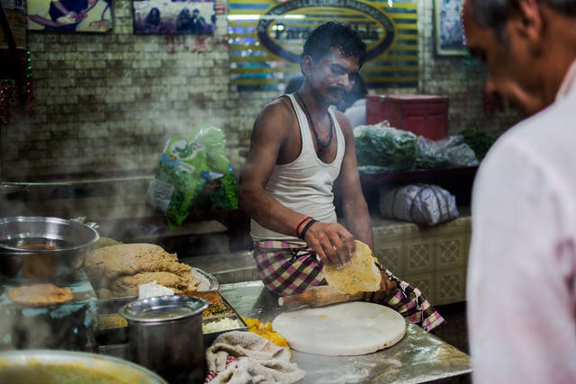 The hawkers serving up piping hot curries in Delhi fear a new scheme will tempt away their regular customers