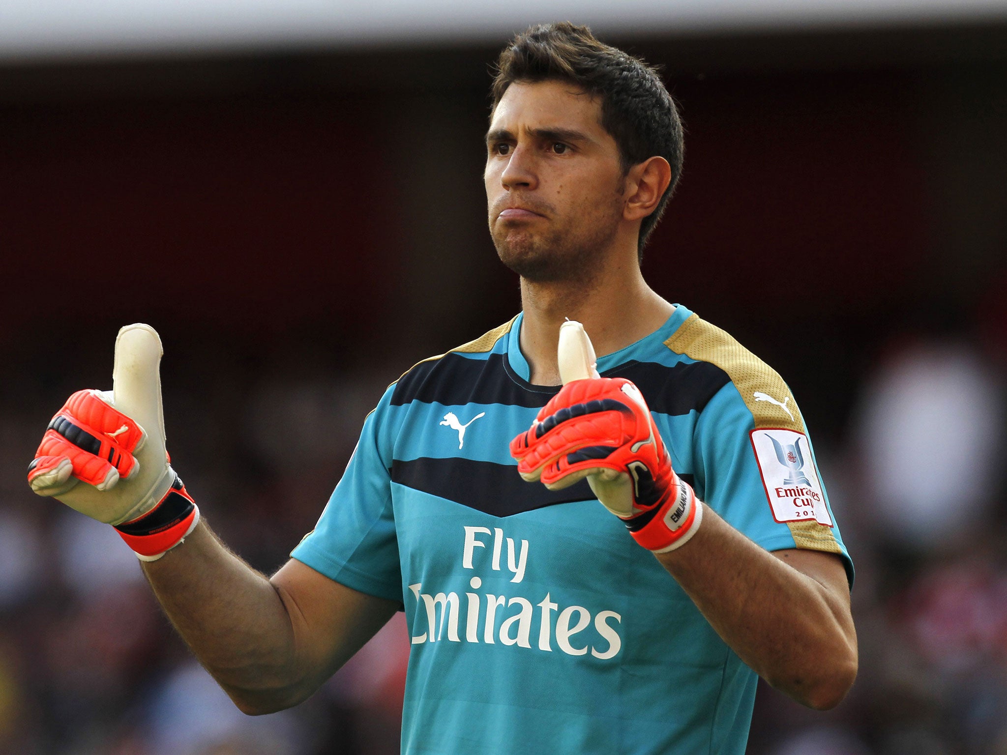 Emiliano Martinez appears pleased enough with the 6-0 victory