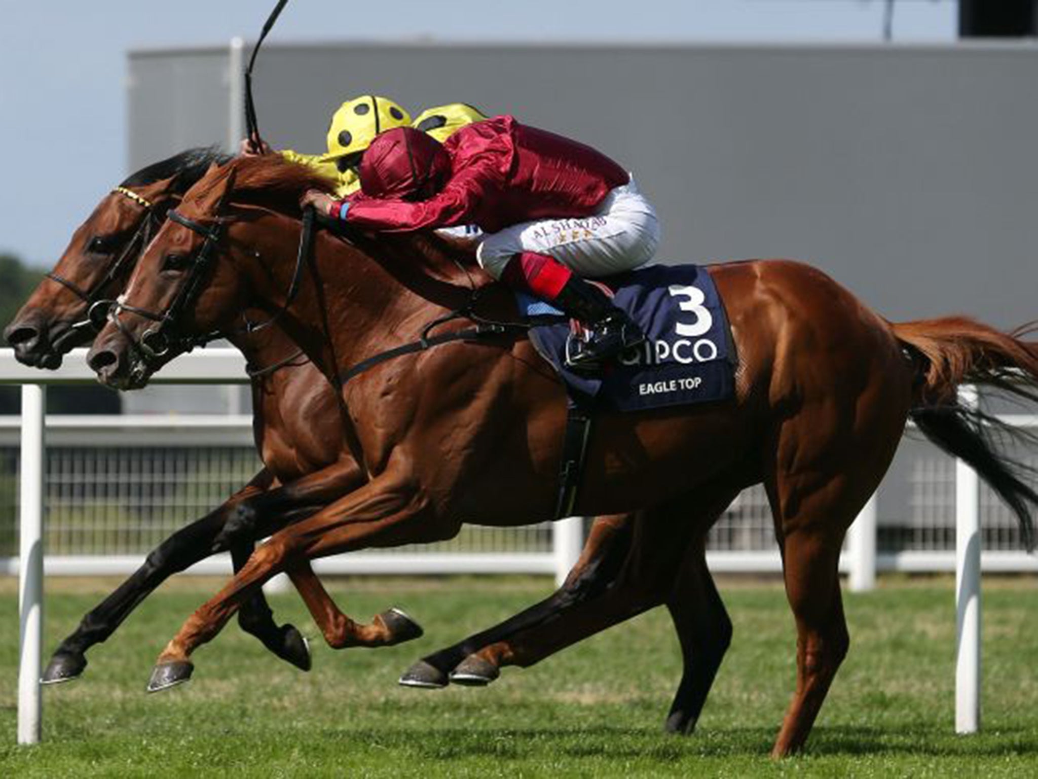 Thrilling finish: Andrea Atzeni pushes Postponed ahead of Frankie Dettori’s Eagle Top to win