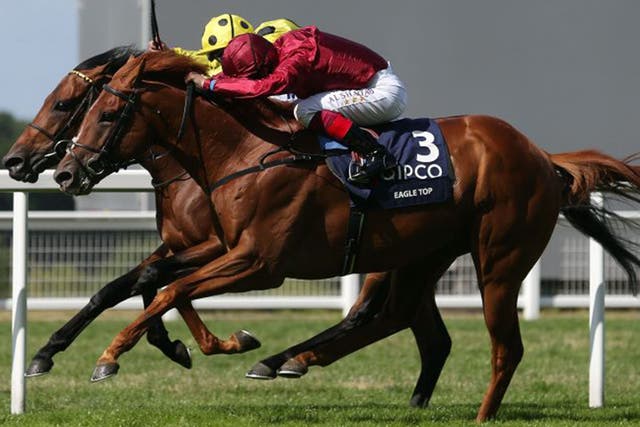 Thrilling finish: Andrea Atzeni pushes Postponed ahead of Frankie Dettori’s Eagle Top to win