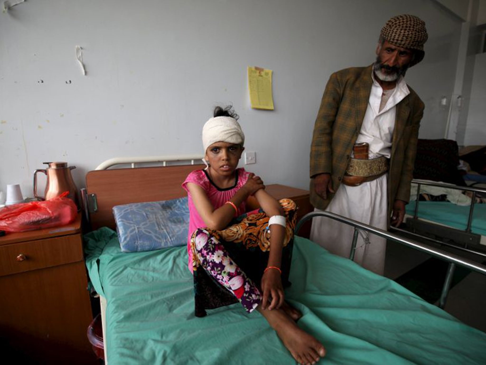 A child injured in the Saudi-led raids recovers in hospital on Saturday