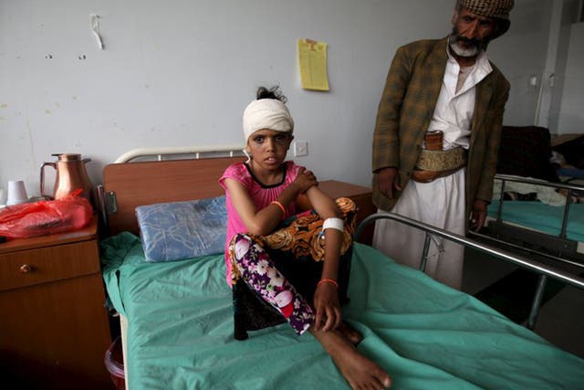 A child injured in the Saudi-led raids recovers in hospital on Saturday