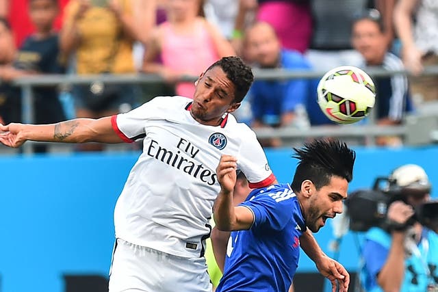 Radamel Falcao (right) challenges for the ball on his Chelsea debut last week