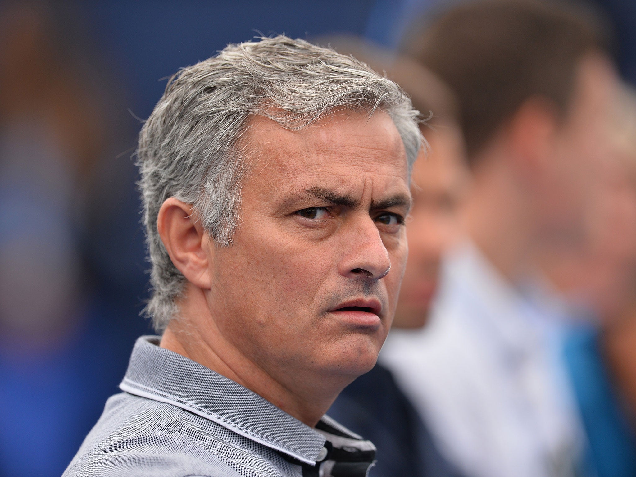 Jose Mourinho looks on from the sidelines