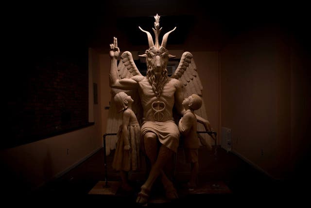 The statue of Baphomet has a goat's head, human body and wings