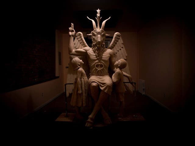 The statue of Baphomet has a goat's head, human body and wings