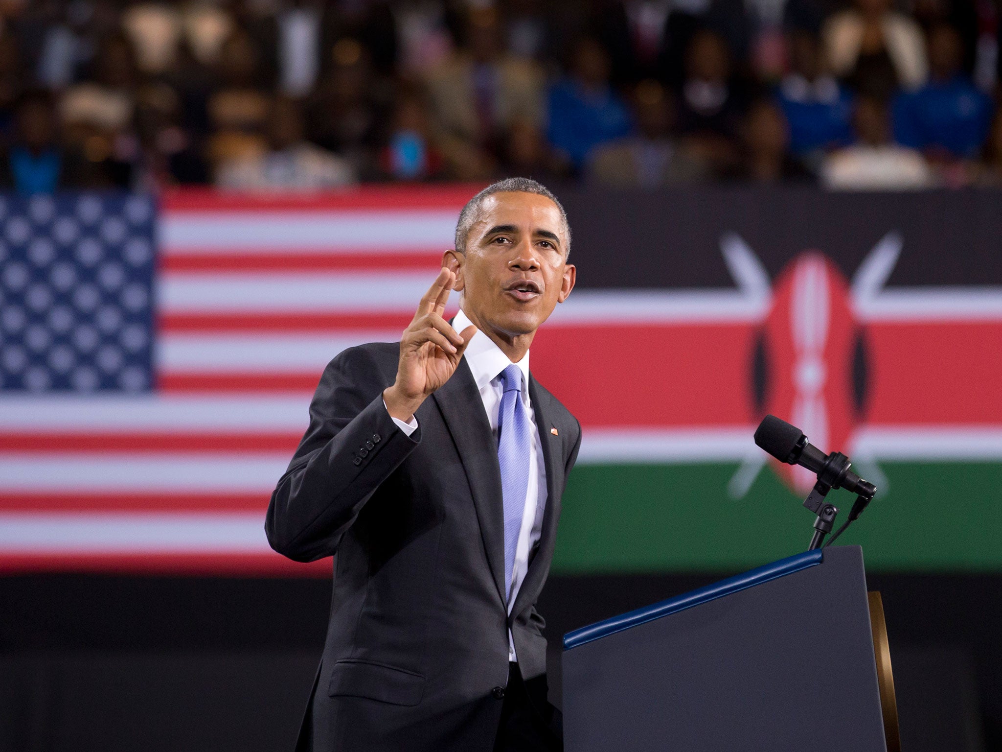 Barack Obama speaking at the Kasarani stadium to enthusiastic crowds at the end of his visit