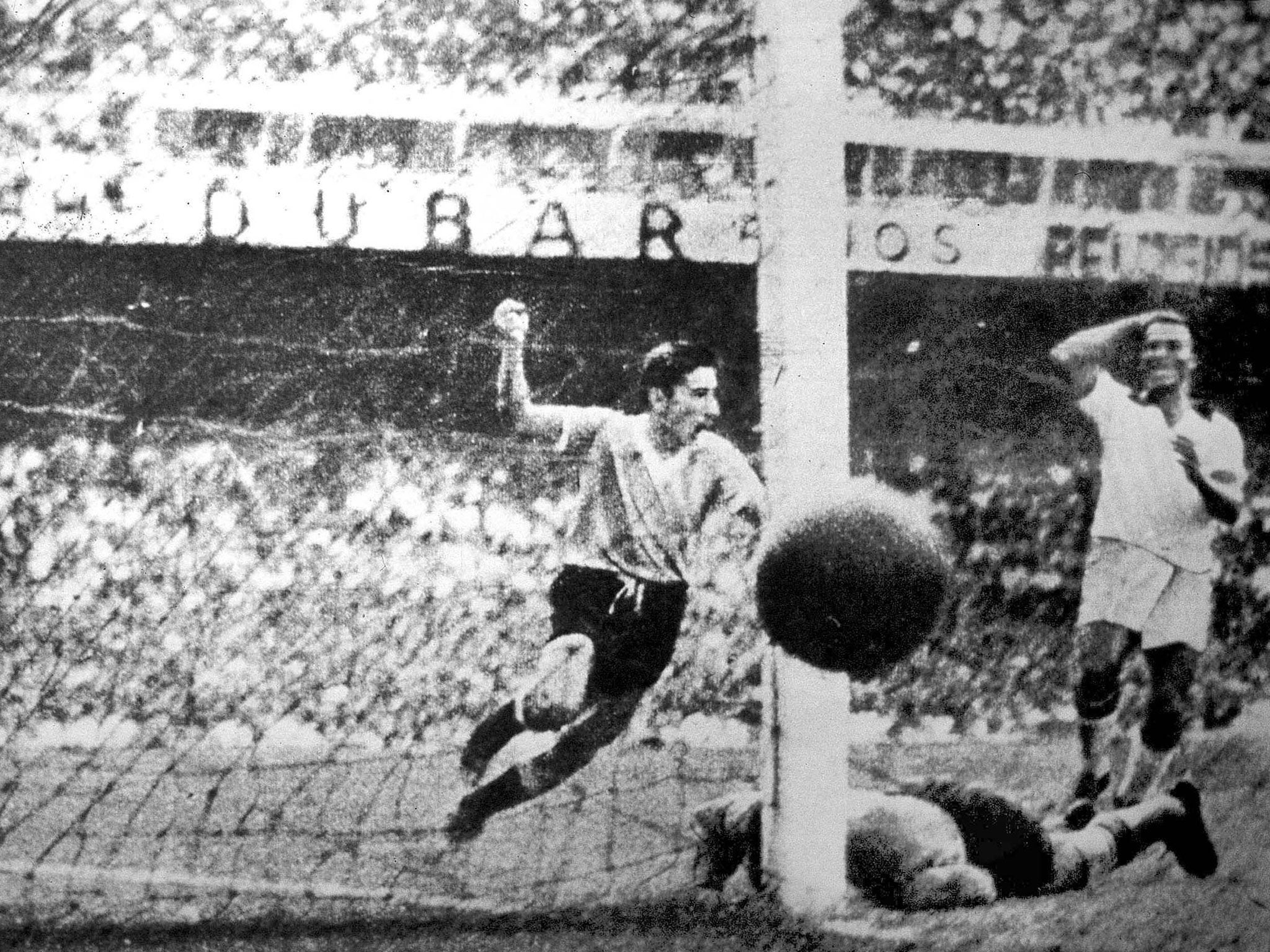 Ghiggia turns away after scoring his famous goal: the Maracana was silenced