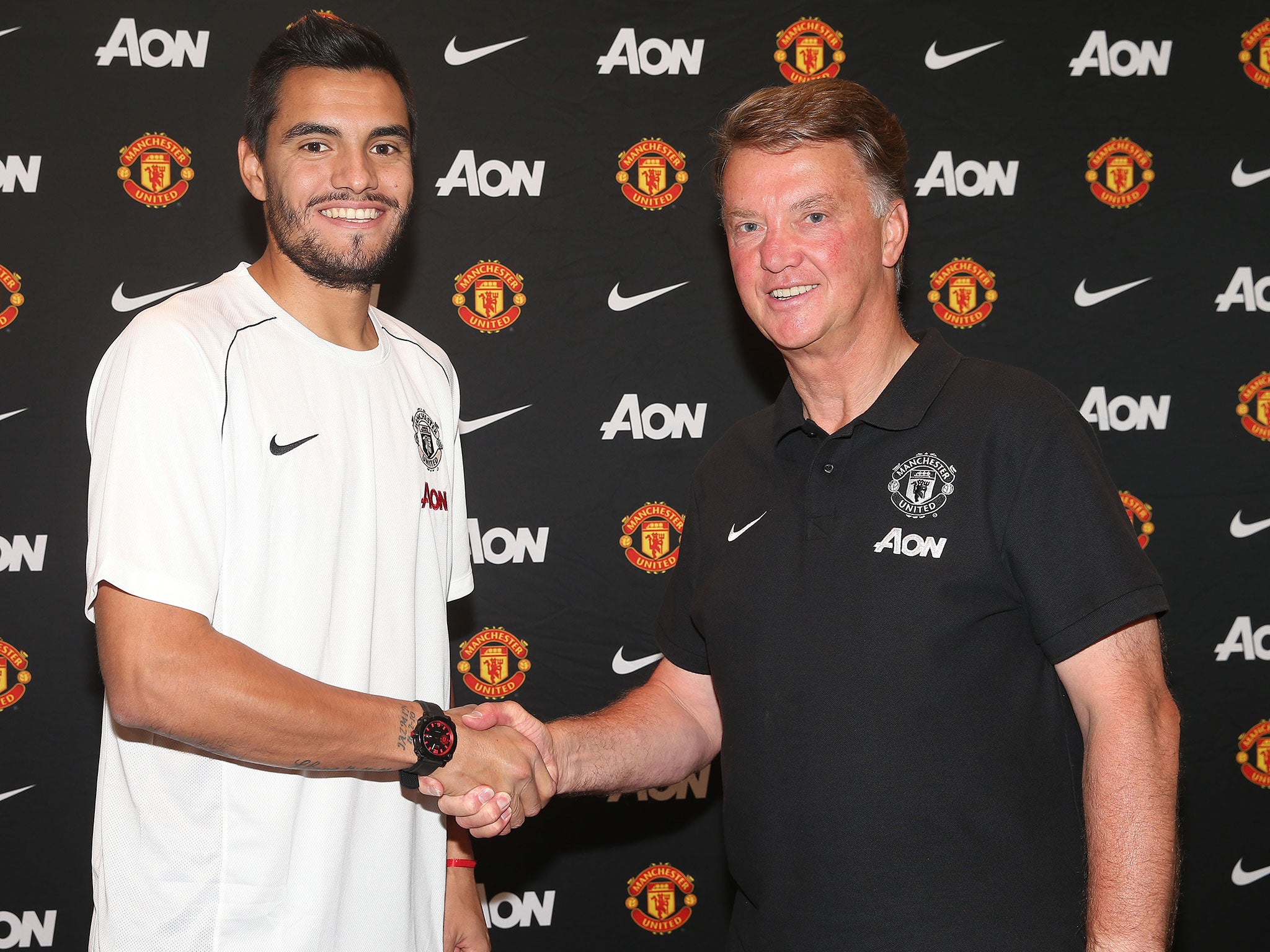 New United goalkeeper Romero alongside Louis van Gaal