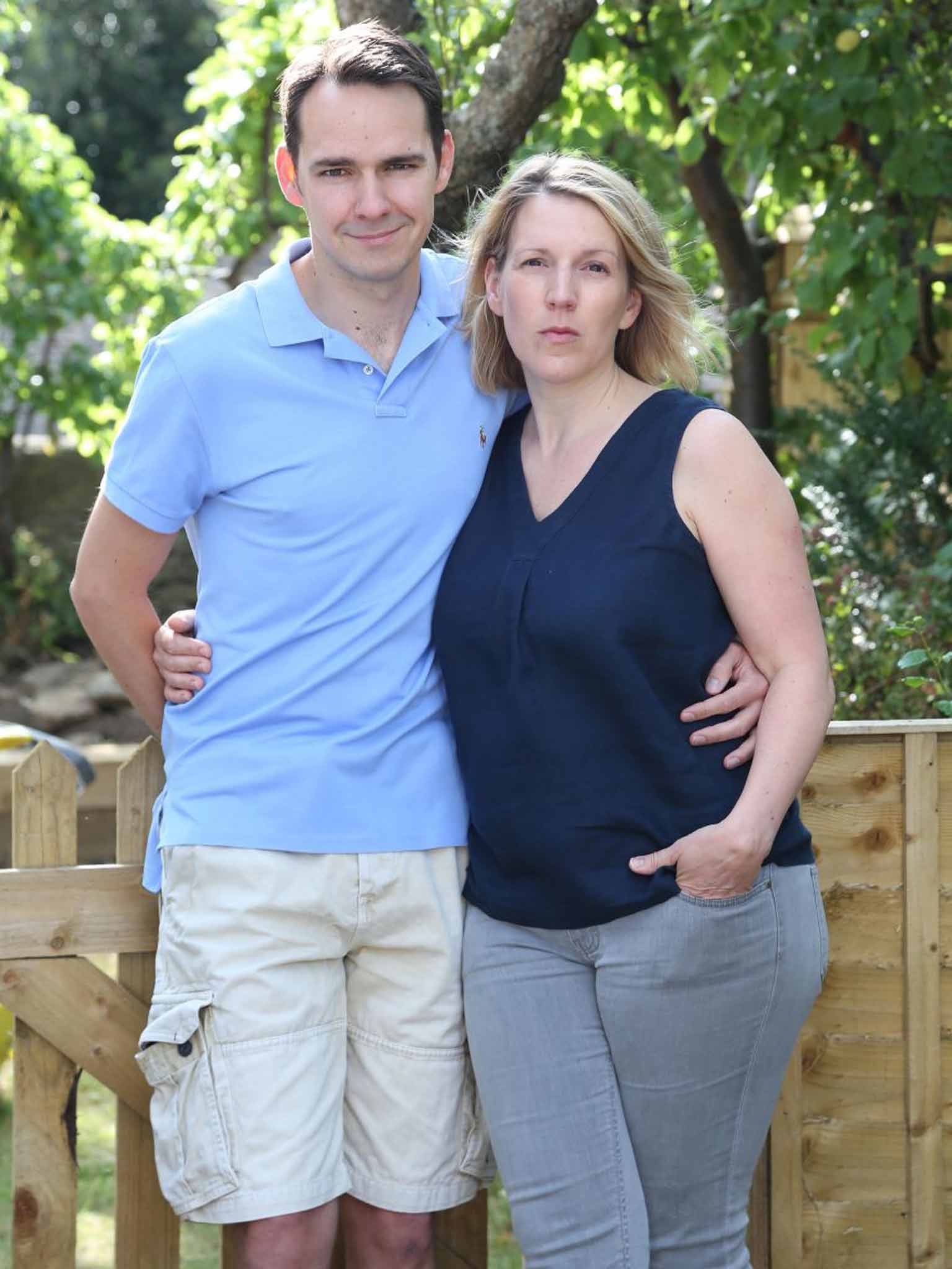 Hannah and David Cole at their home in Kirtlington, Oxfordshire. Their son Oscar, left, died last year after developing encephalitis