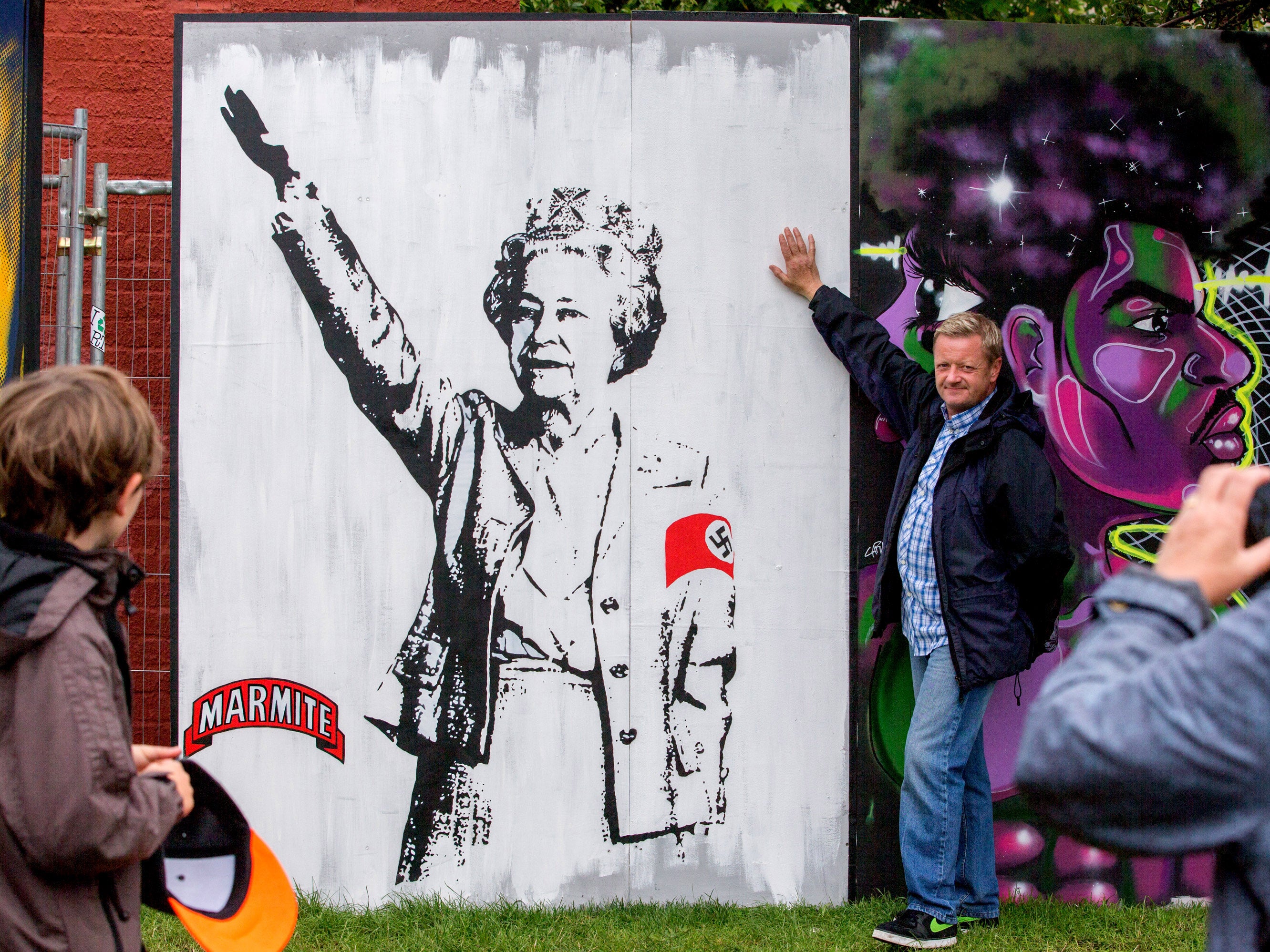 A Mural by artist T.wat referencing the Queen's recent nazi salute media controversy was a major attraction at the festival.
