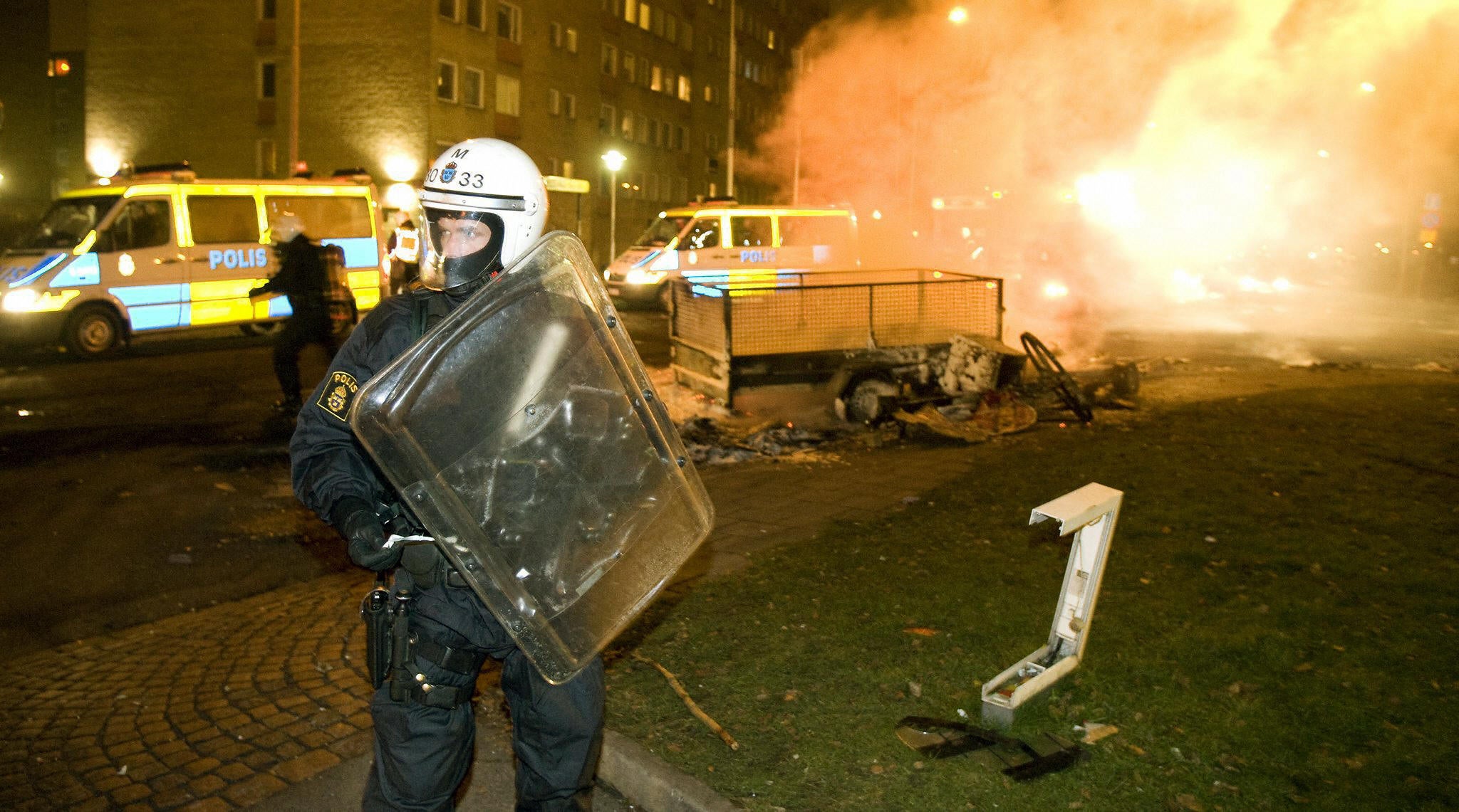 Riot police on the streets during the Rosengård riots of 2008, which were exacerbated by tensions between the area's large immigrant community and the police