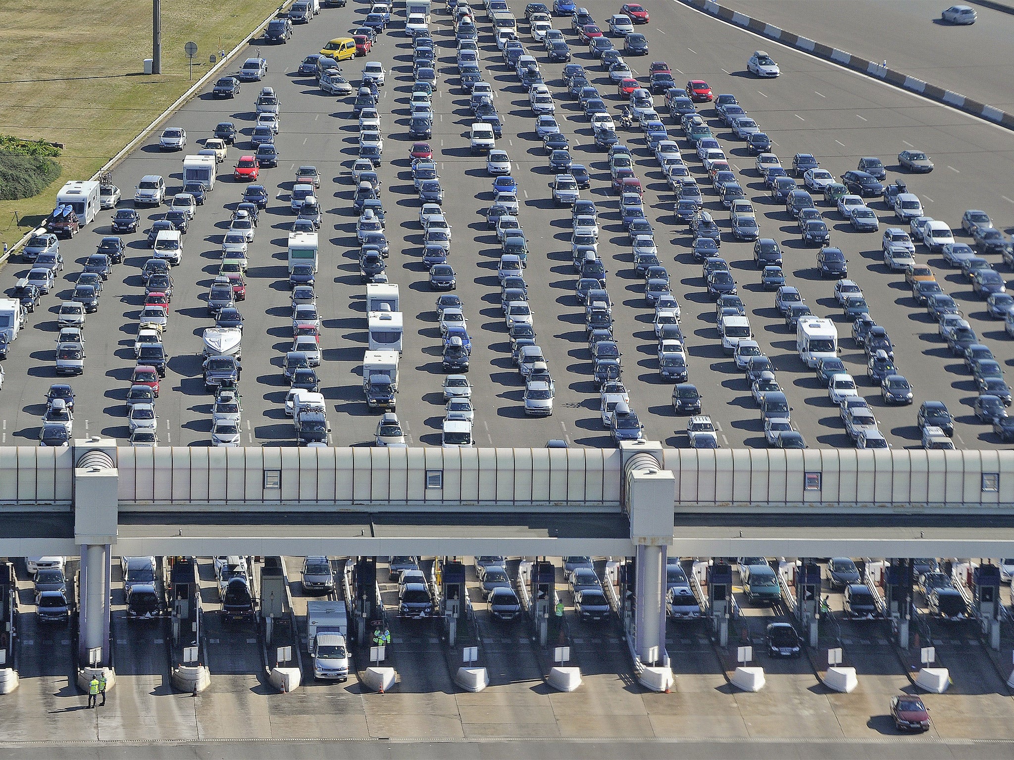 Choking the planet: Cars lined up near a toll station in France (AFP/Getty Images)