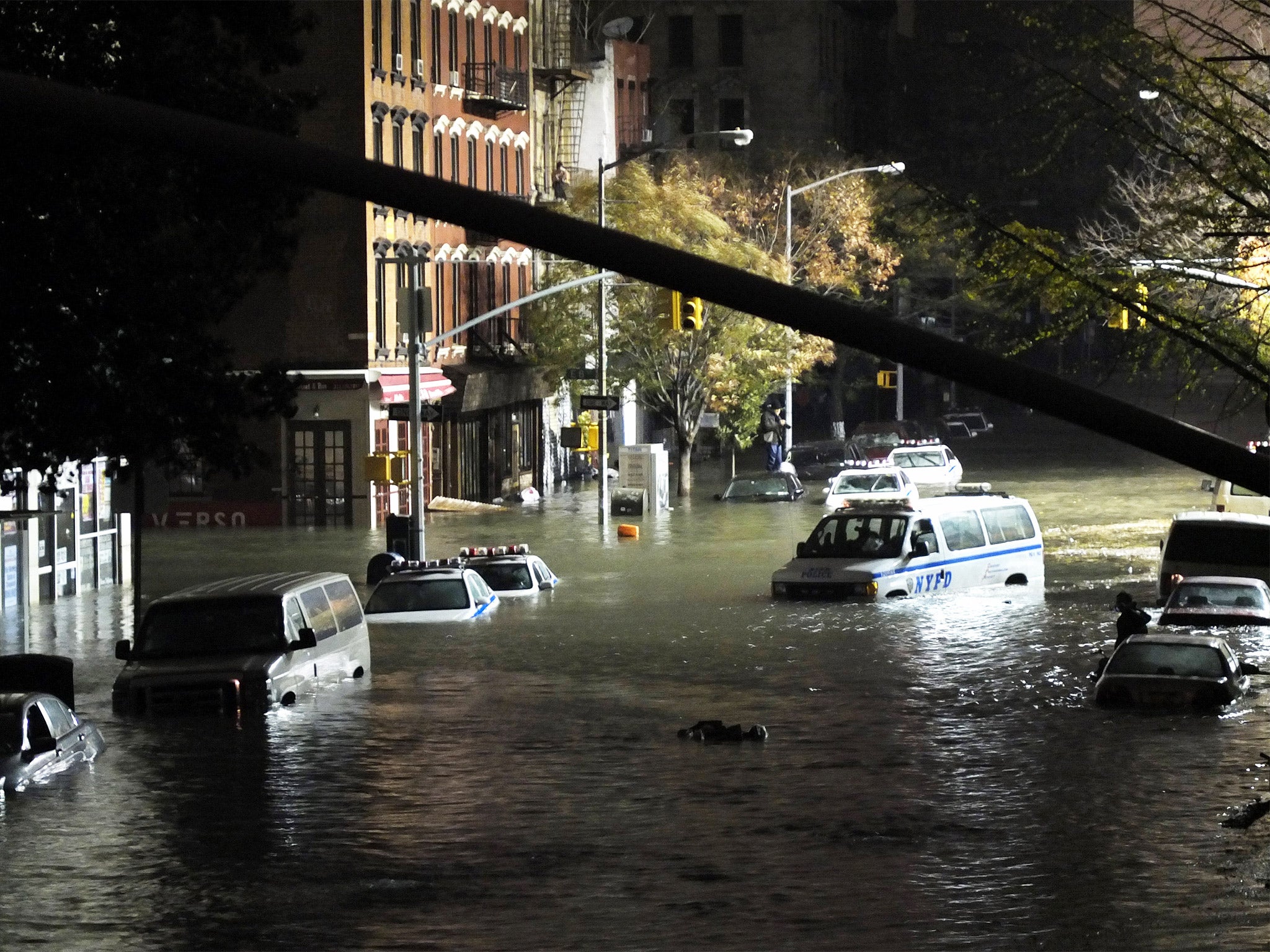 Rising panic: cars submerged in Manhattan after Hurricane Sandy in 2012 (Getty)