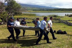Possible MH370 debris found - live