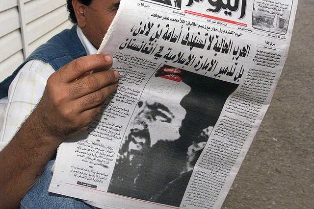 Mullah Omar, pictured on the front of an Algerian newspaper in 2001