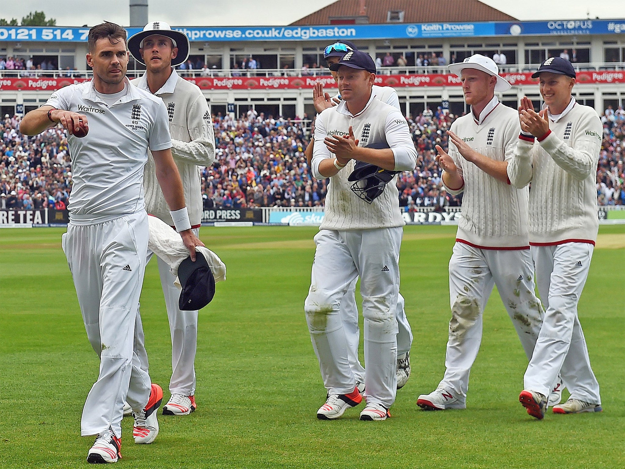 Jimmy Anderson leads England off after taking 6 for 47