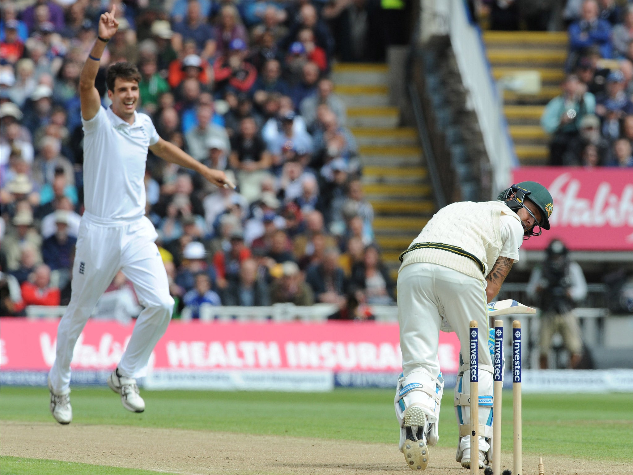 Steve Finn celebrates bowling the Australia captain, Michael Clarke, with a fast yorker