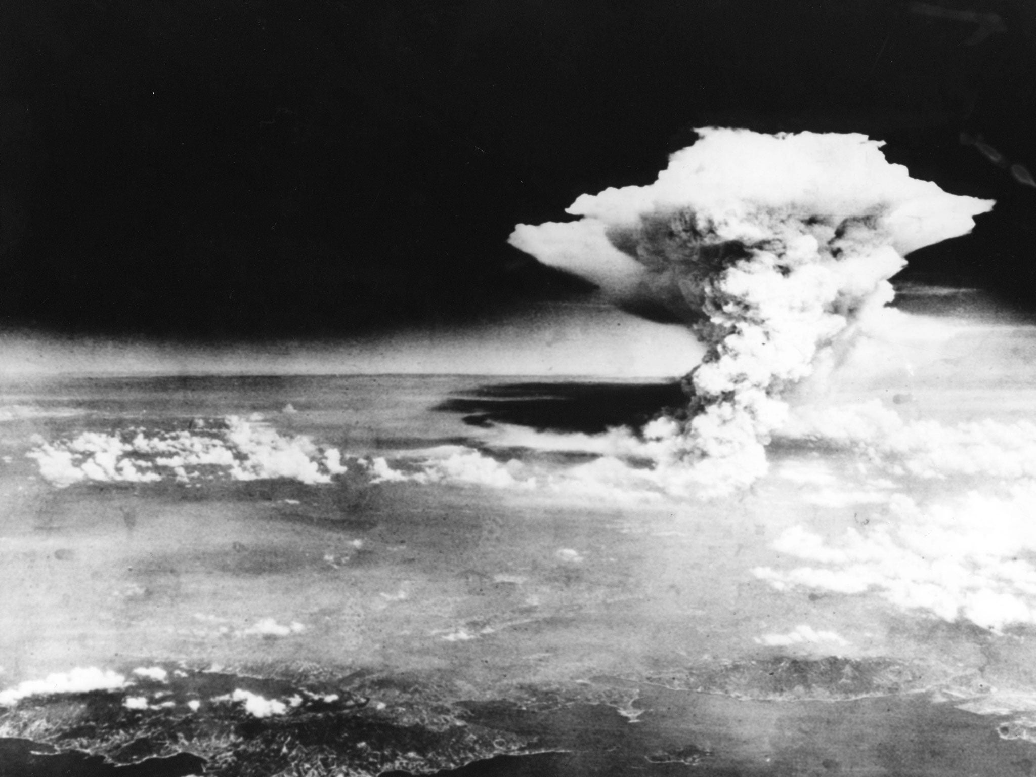 The mushroom cloud over Hiroshima after Enola Gray and her crew dropped the bomb