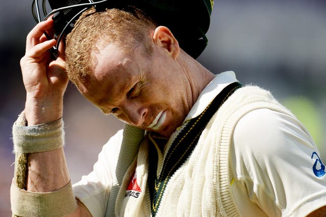 Chris Rogers heads for the pavilion after being dismissed by Stuart Broad