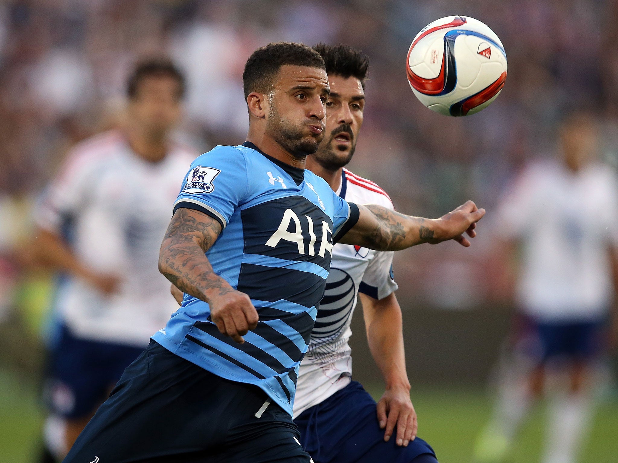 Kyle Walker of Spurs battles with David Villa of the MLS All-Stars
