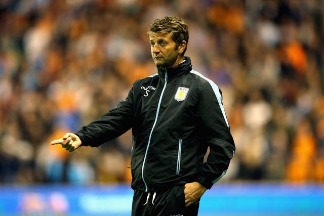 Tim Sherwood watches on during the friendly with Wolves