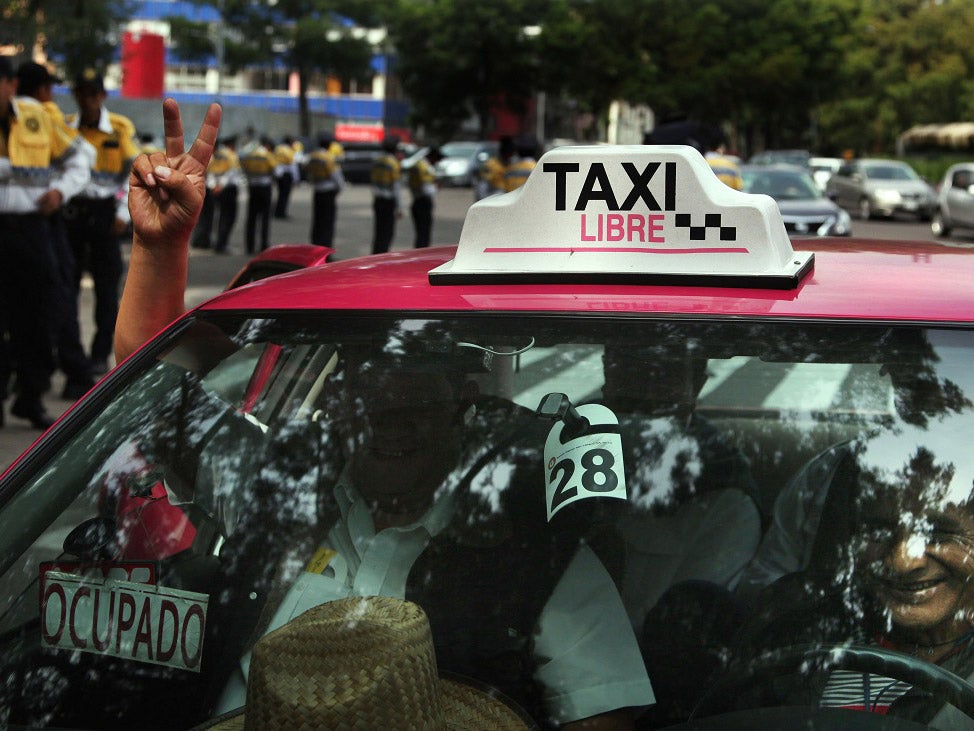 Licensed taxi drivers protested against the app-based Uber service in Mexico City