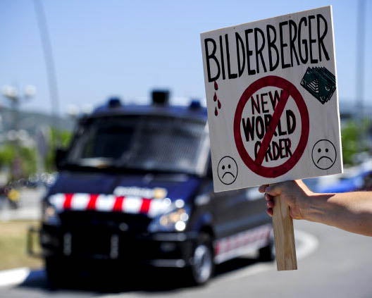 Conspiracy theorists protest against the secretive Bilderberg conference which they believe is the meeting place of the new world order