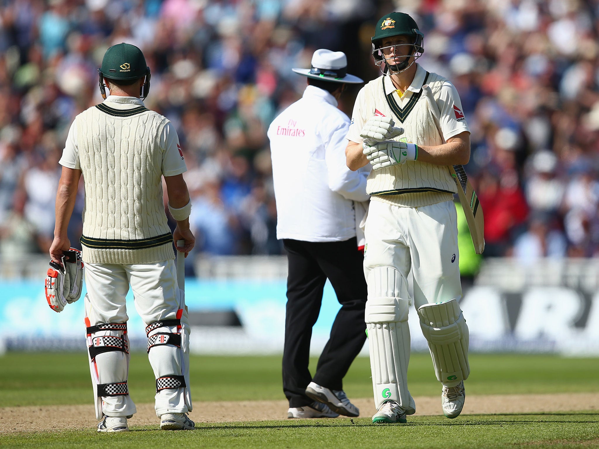 Adam Voges (right) walks to the pavilion after being out for a duck