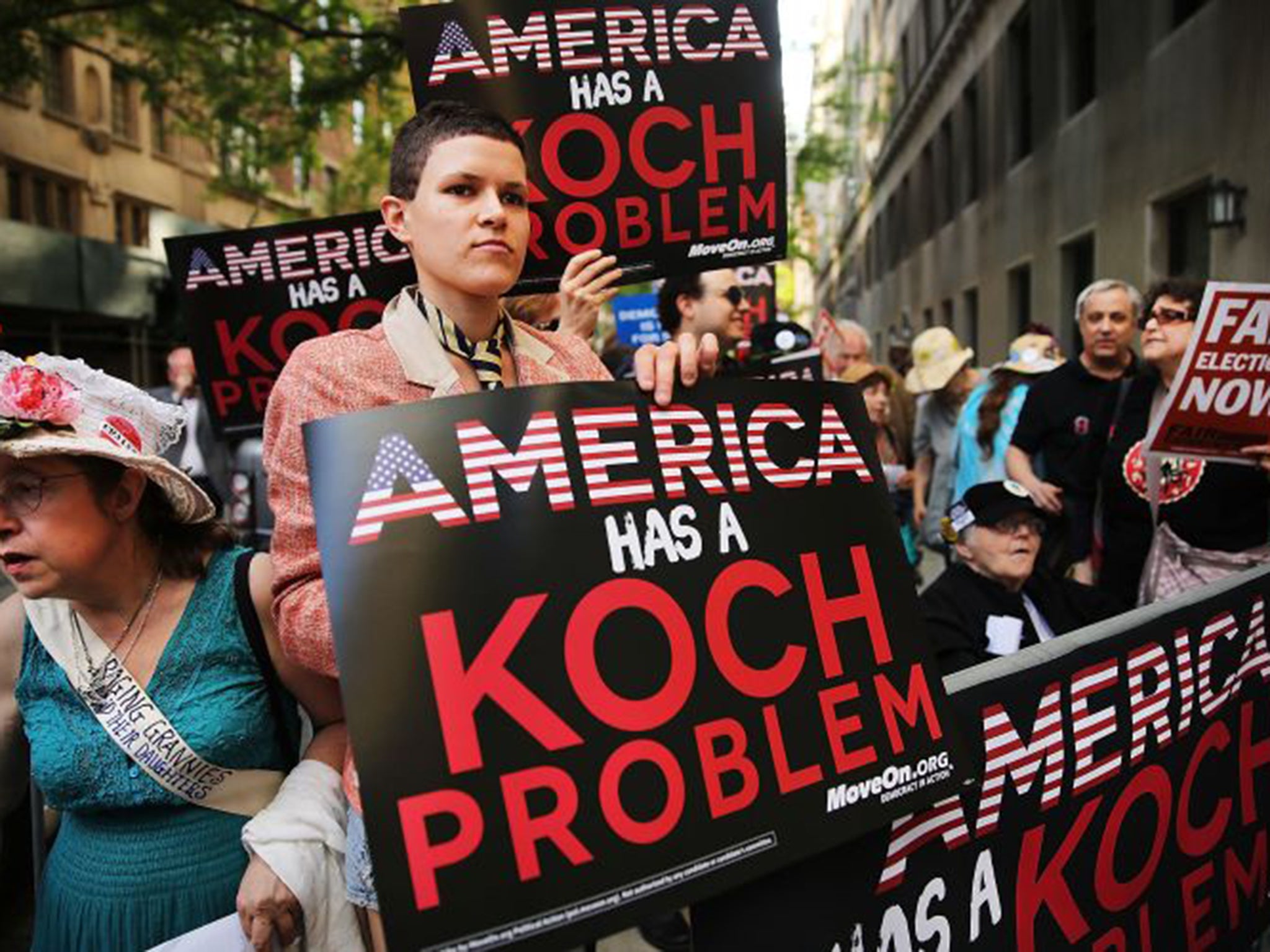 Republican campaign donations by billionaires David and Charles Koch led to protests in New York by critics who accuse them of skewing the political playing field