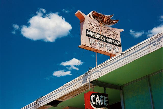 Wenders captured the perennial blue skies, retro signs and kitsch interiors that fans of the film will recognise