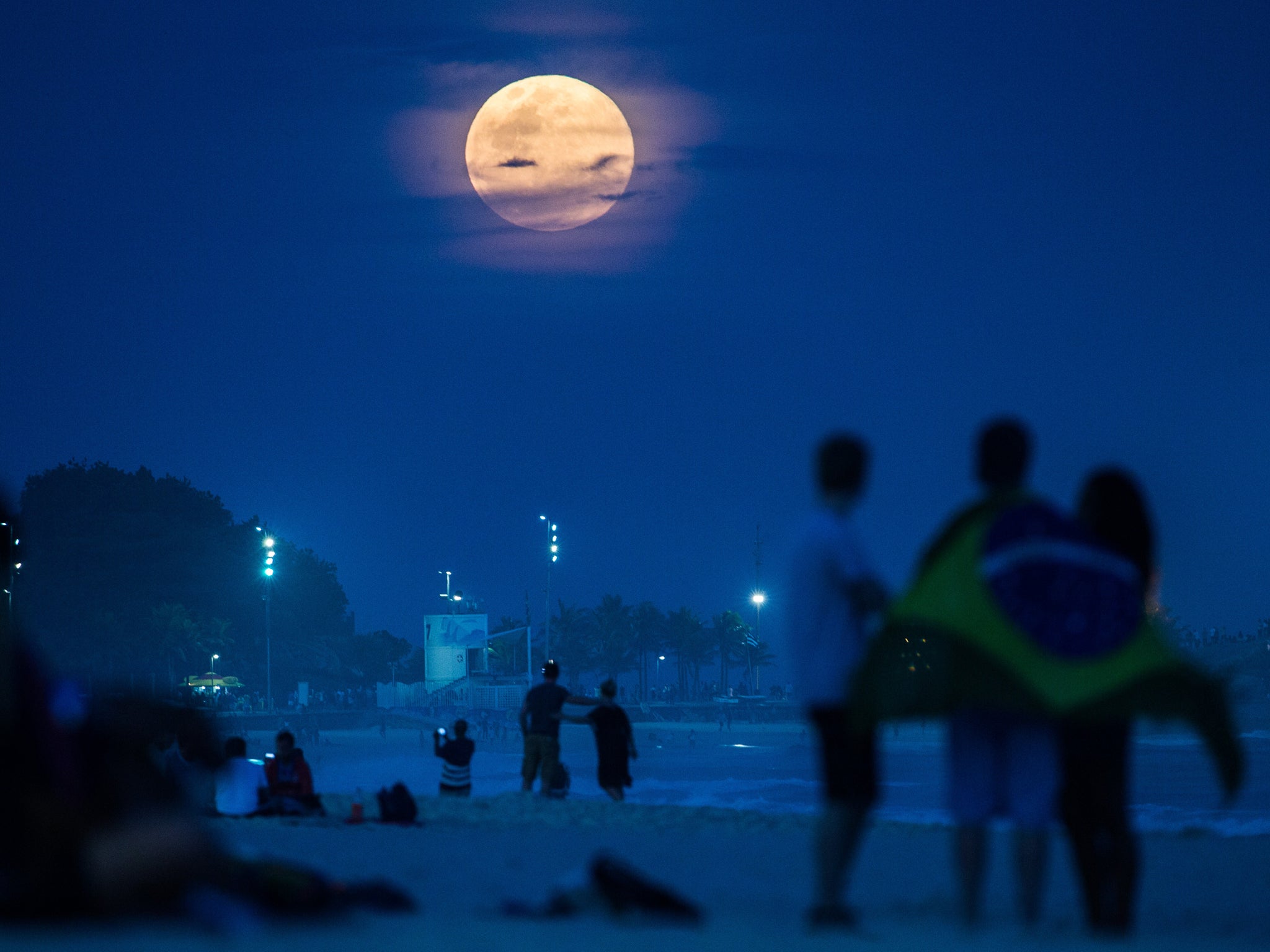 The full moon, nicknamed 'the supermoon', rises at Ipanema beach in Rio de Janeiro, Brazil, on August 10, 2014. The blue moon should look a little like this