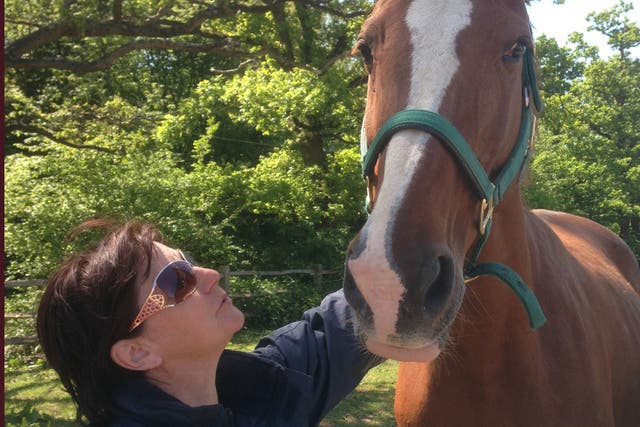 Carol Jackson (left) and a horse at Kilmarnock Rescue