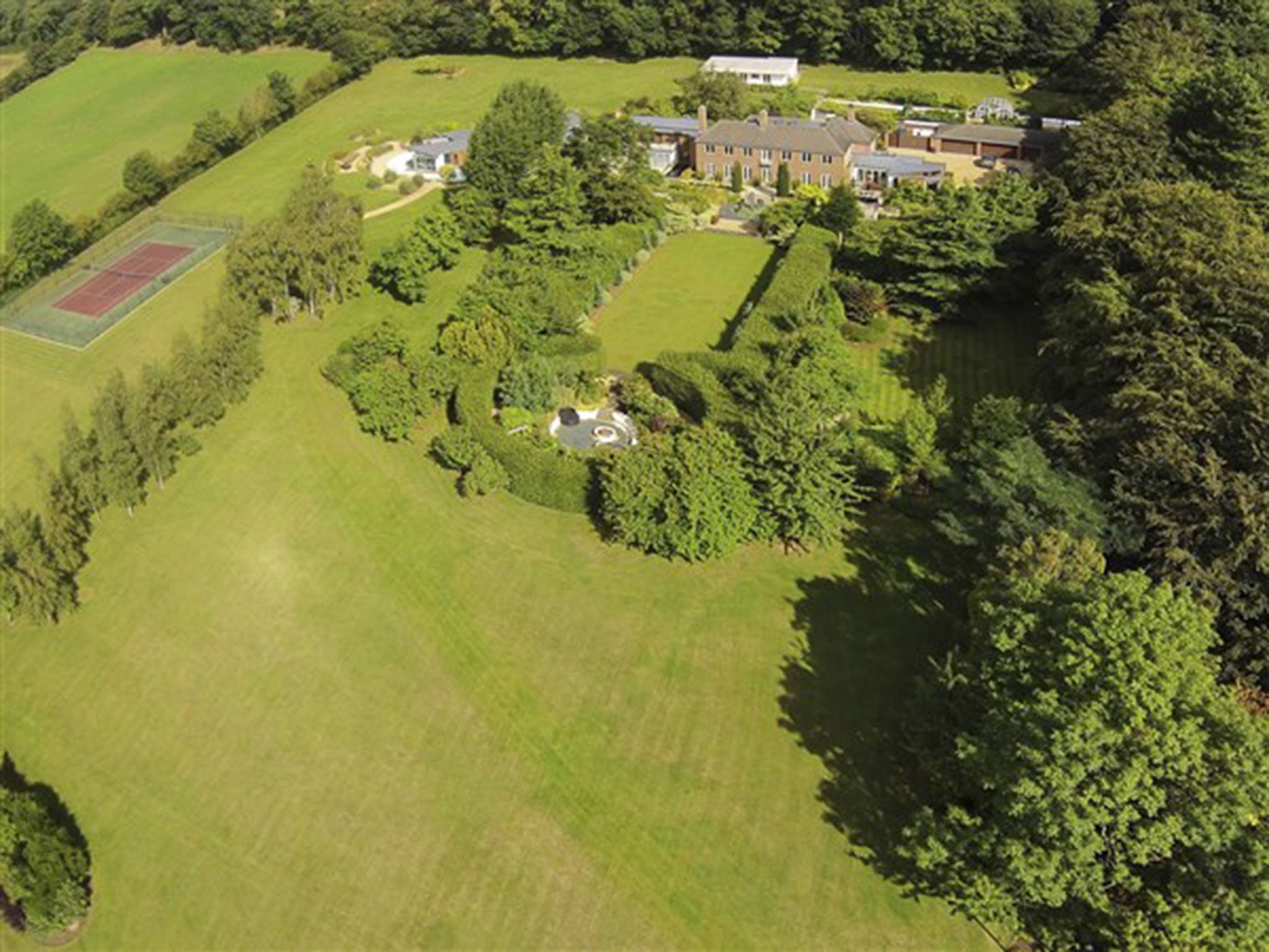 The fully enclosed grounds amount to more than 8 acres in area