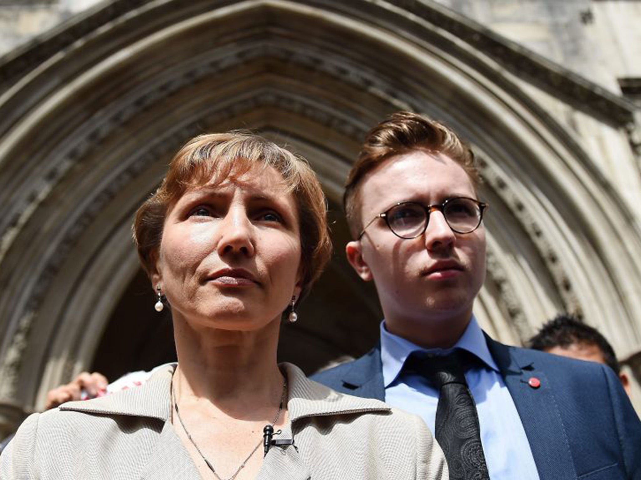 Marina Litvinenko, widow of Alexander Litvinenko, and son Anatoly, makes a statement outside the High Court in London, Britain, 31 July 2015