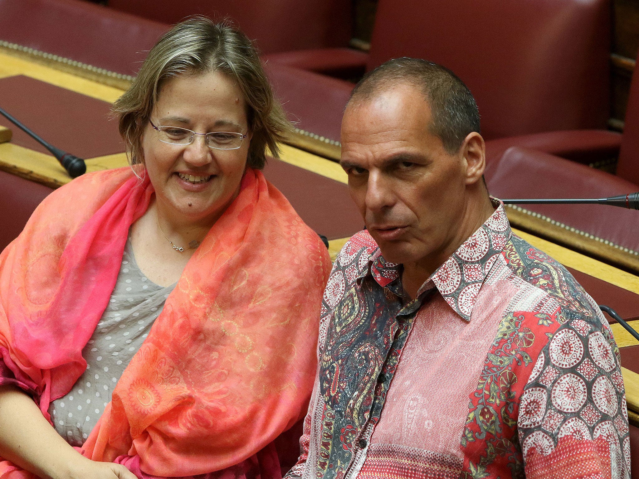 Greek Former Finance Minister Yanis Varoufakis and Vasiliki Katrivanou (L), a Syriza member of parliament