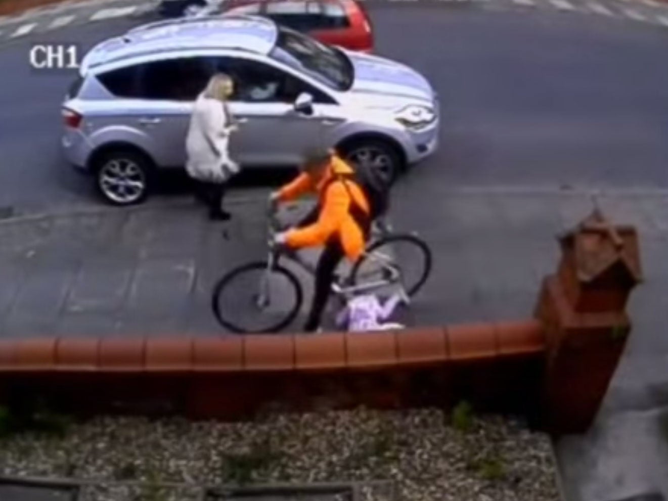 CCTV footage shows Andrew Holland dragging Lucie Wilding across the pavement after hitting her with his bike