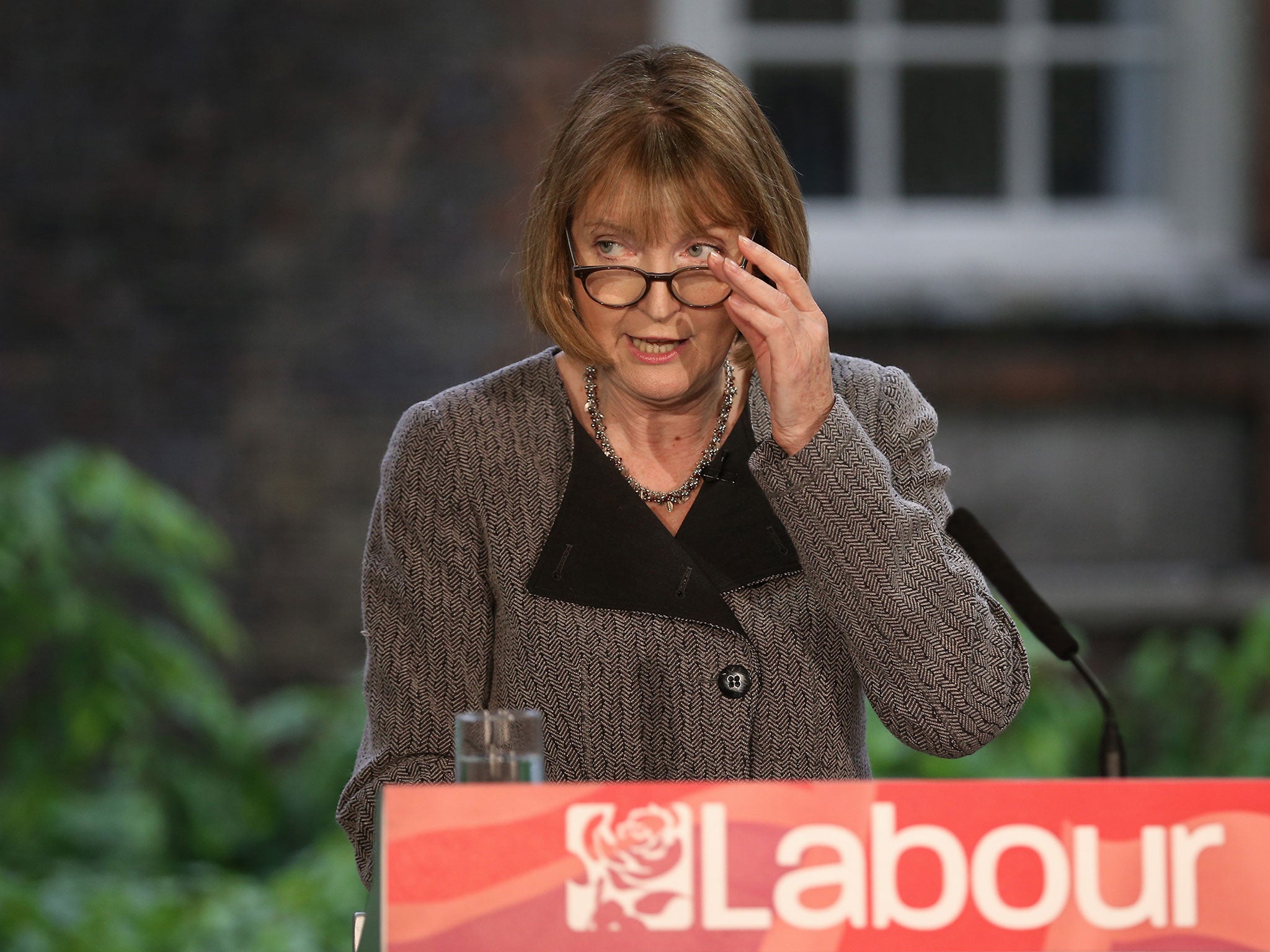 Labour party interim leader Harriet Harman speaks to reporters and supporters