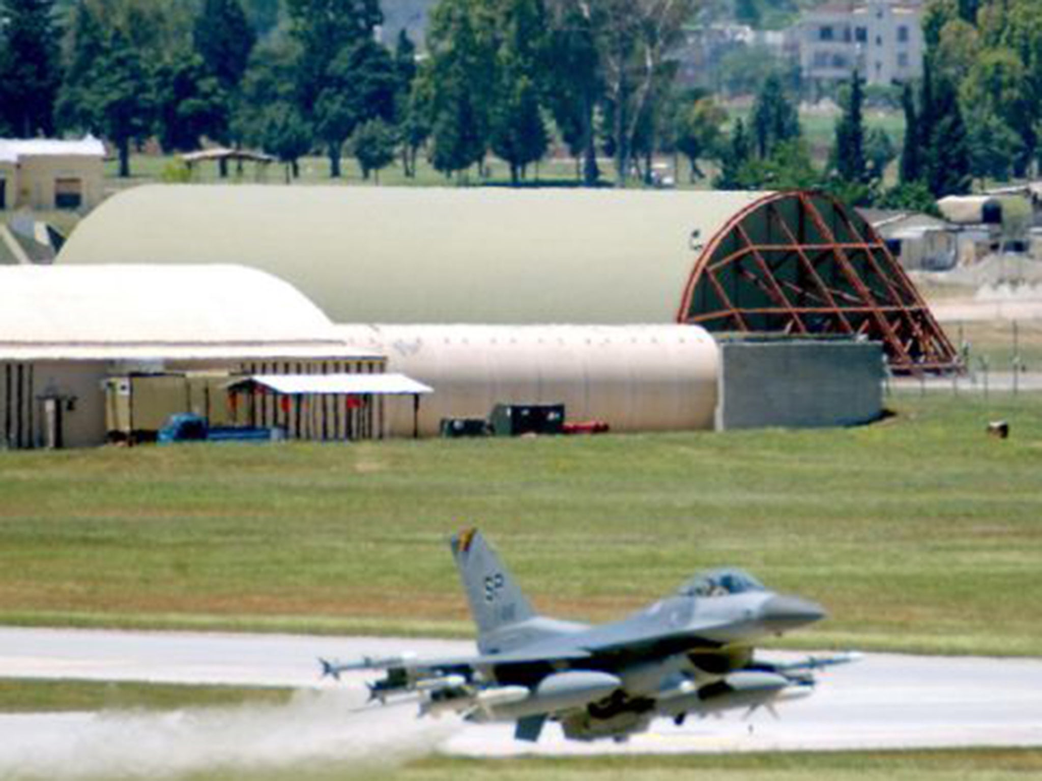 The big stick: An F-16 fighter at Incirlik last month, but  when will they attack IS?